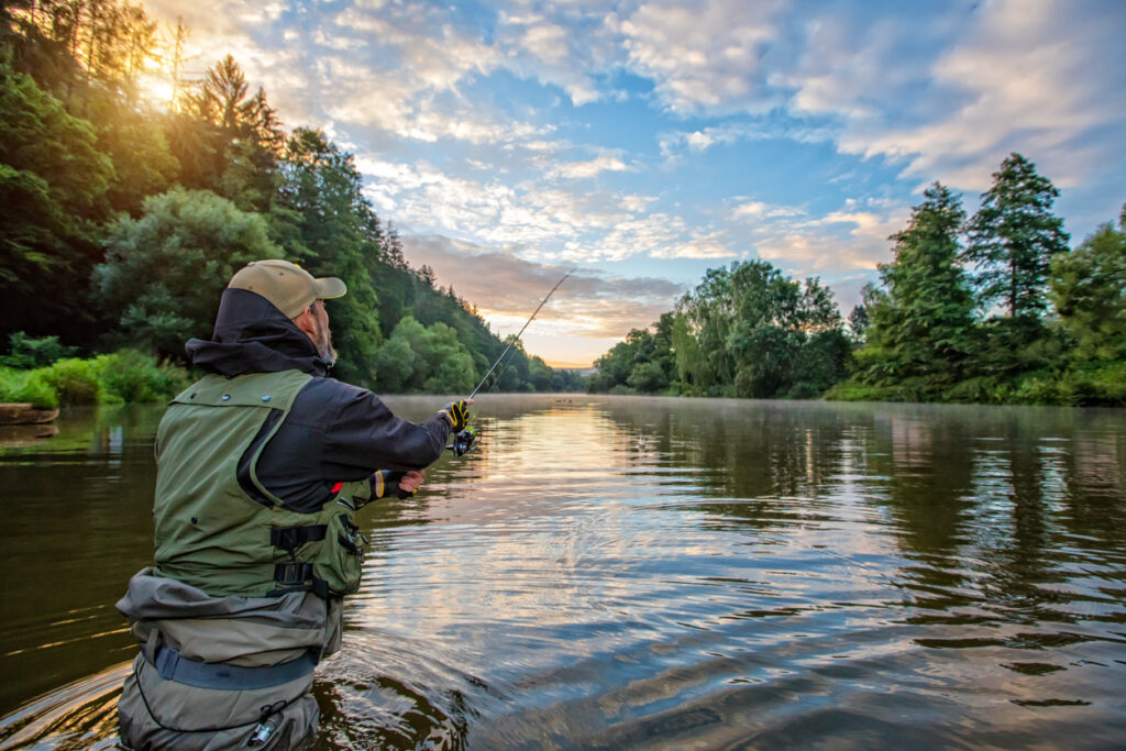 BATTALION BAIT SPORT FISHING HUNTING PREDATOR FISH ON RIVER DURING SUNRISE